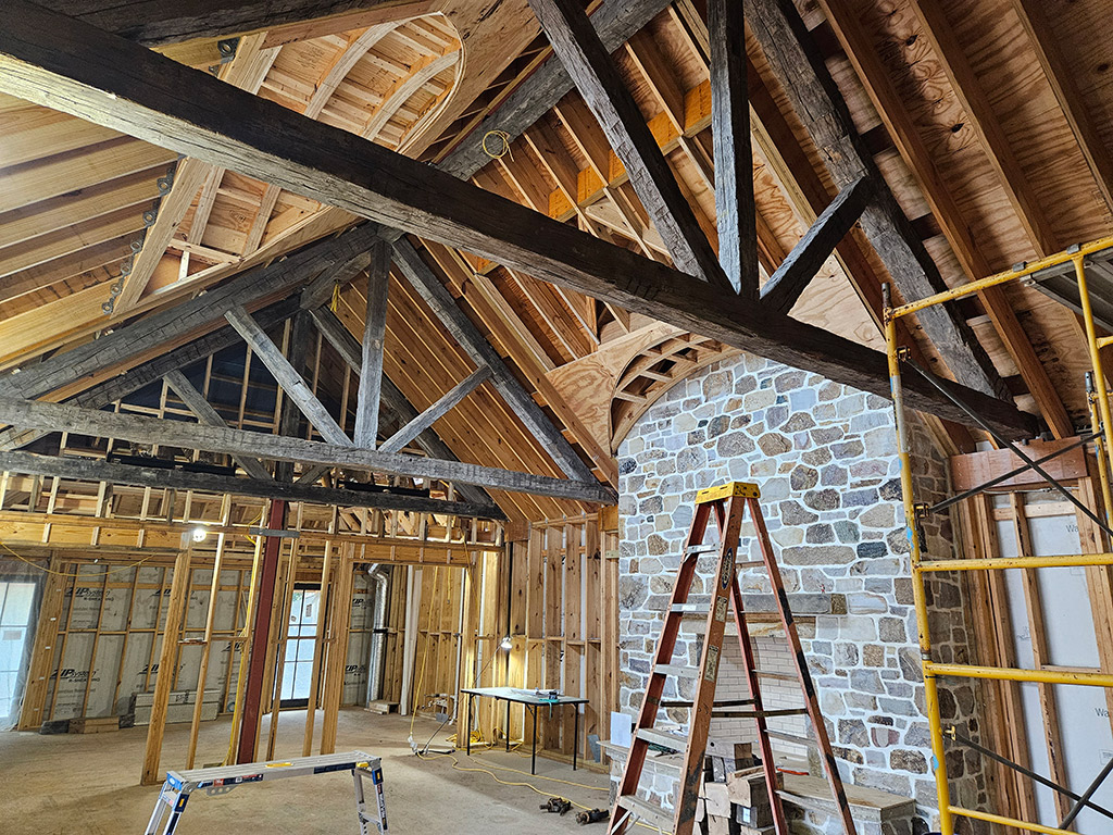 Great room timber truss installation.