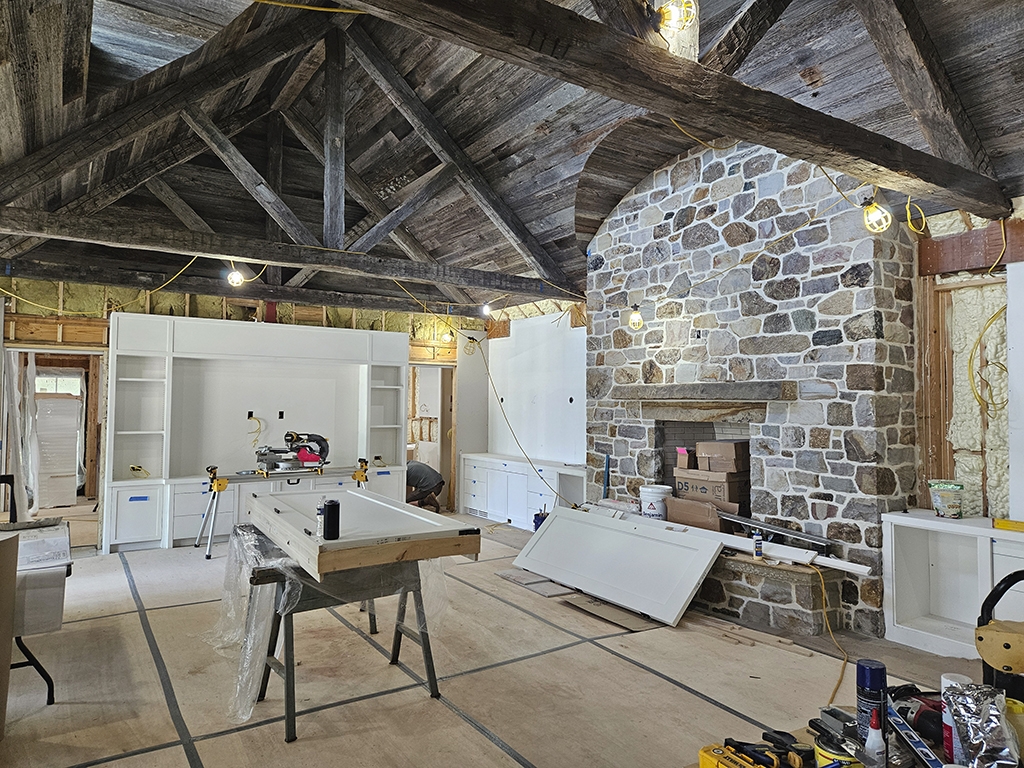 Cabinetry install for poolhouse great room.