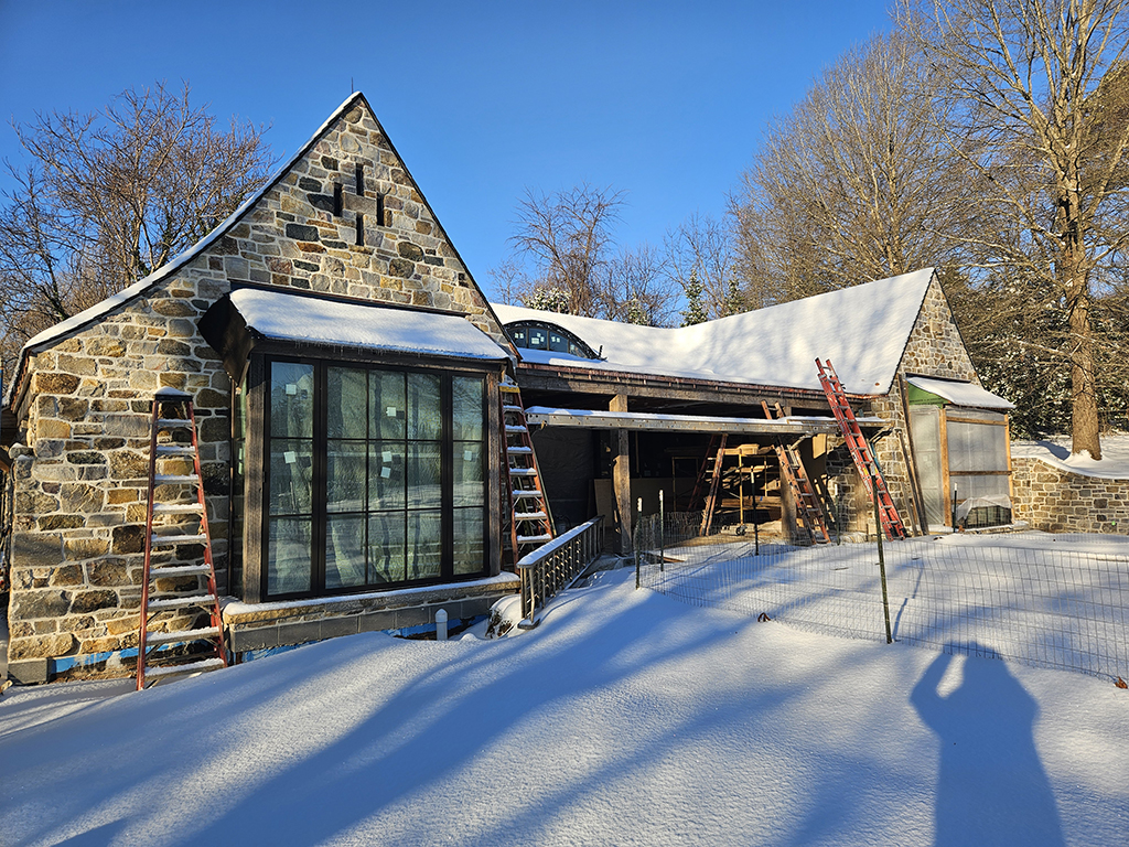 Exterior stone installed at poolhouse.