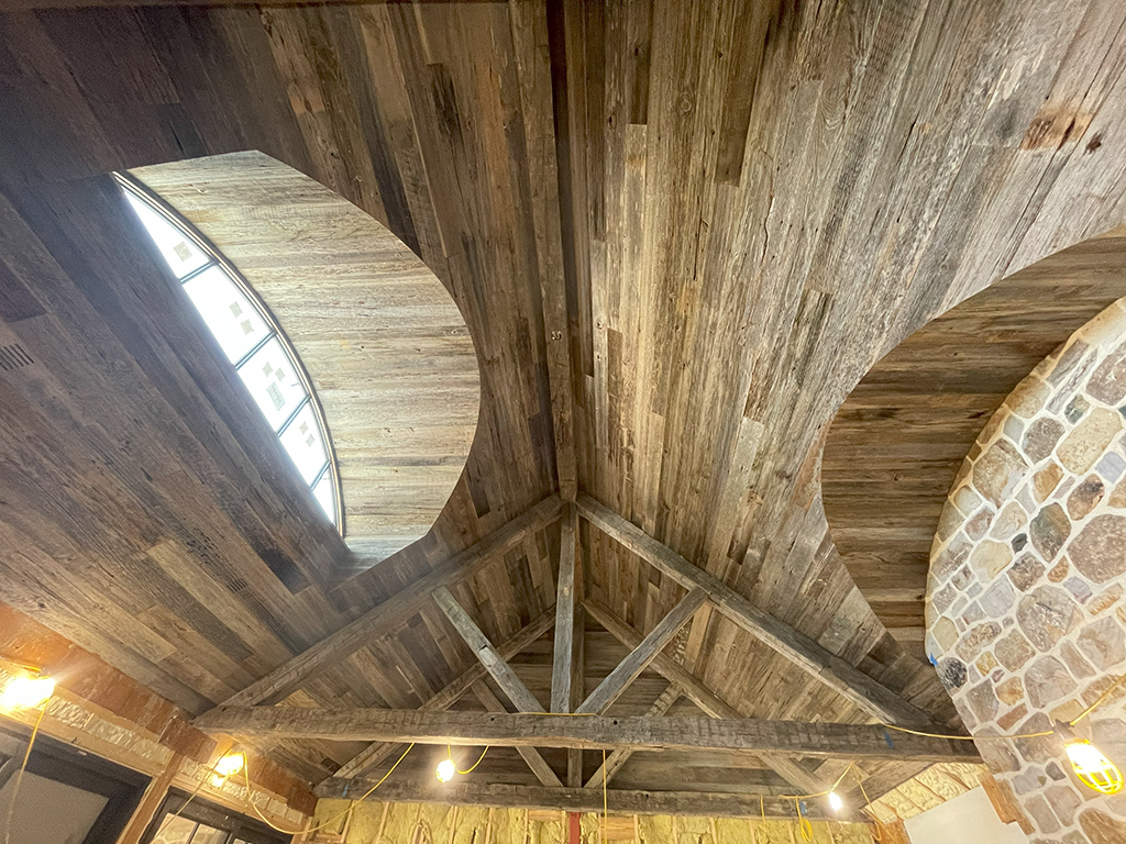 Reclaimed wood ceiling at poolhouse.
