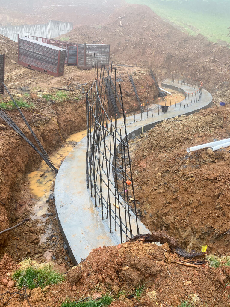 Footing progress for curving site wall